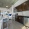 Well-lit kitchen with ample counter space