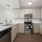 Well-lit kitchen with ample counter space