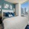 Bedroom with natural lighting and high ceilings